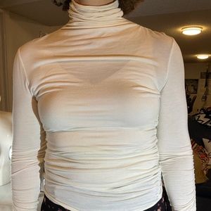 Figure flattering Turtleneck, with with side ruching on neck, body and arms, M